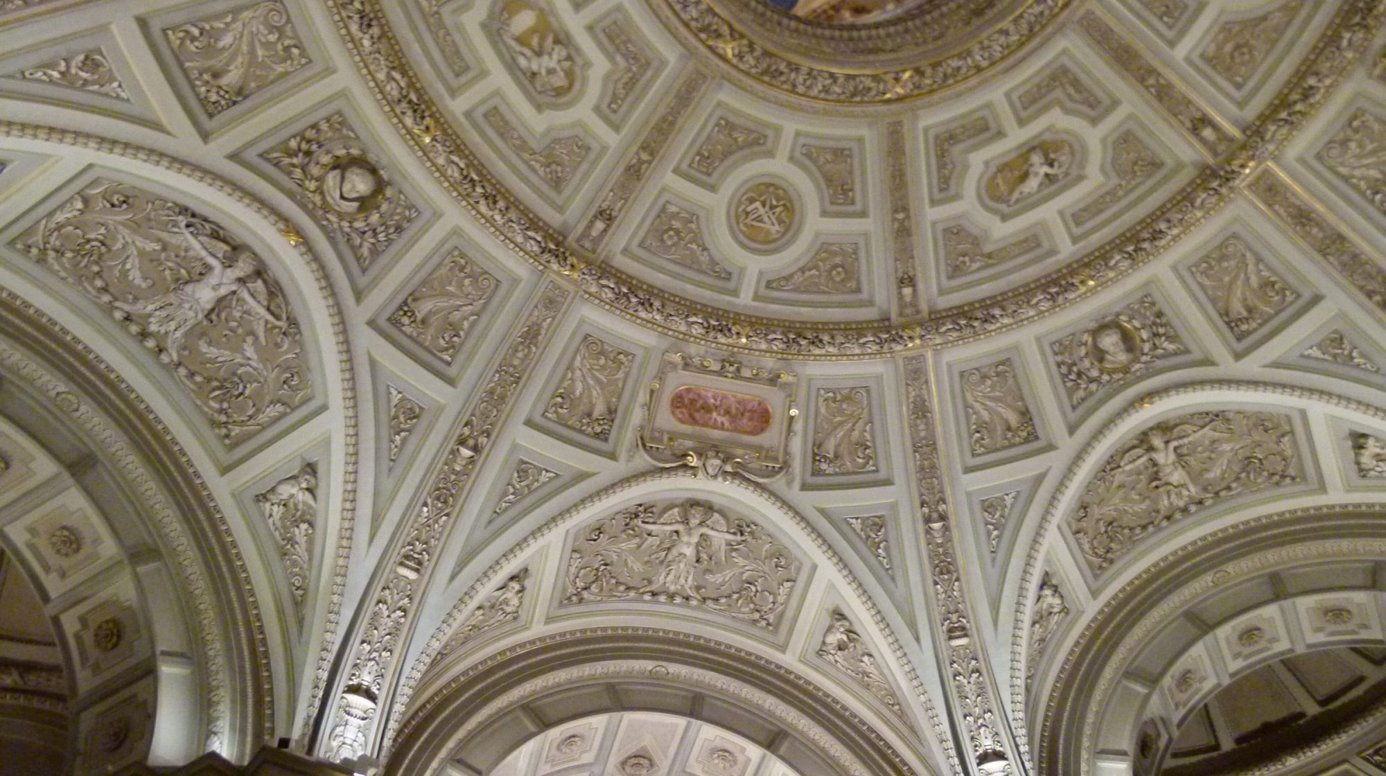 The richly decorated dome and vaulting above the main staircase of the Kunsthistorisches Museum